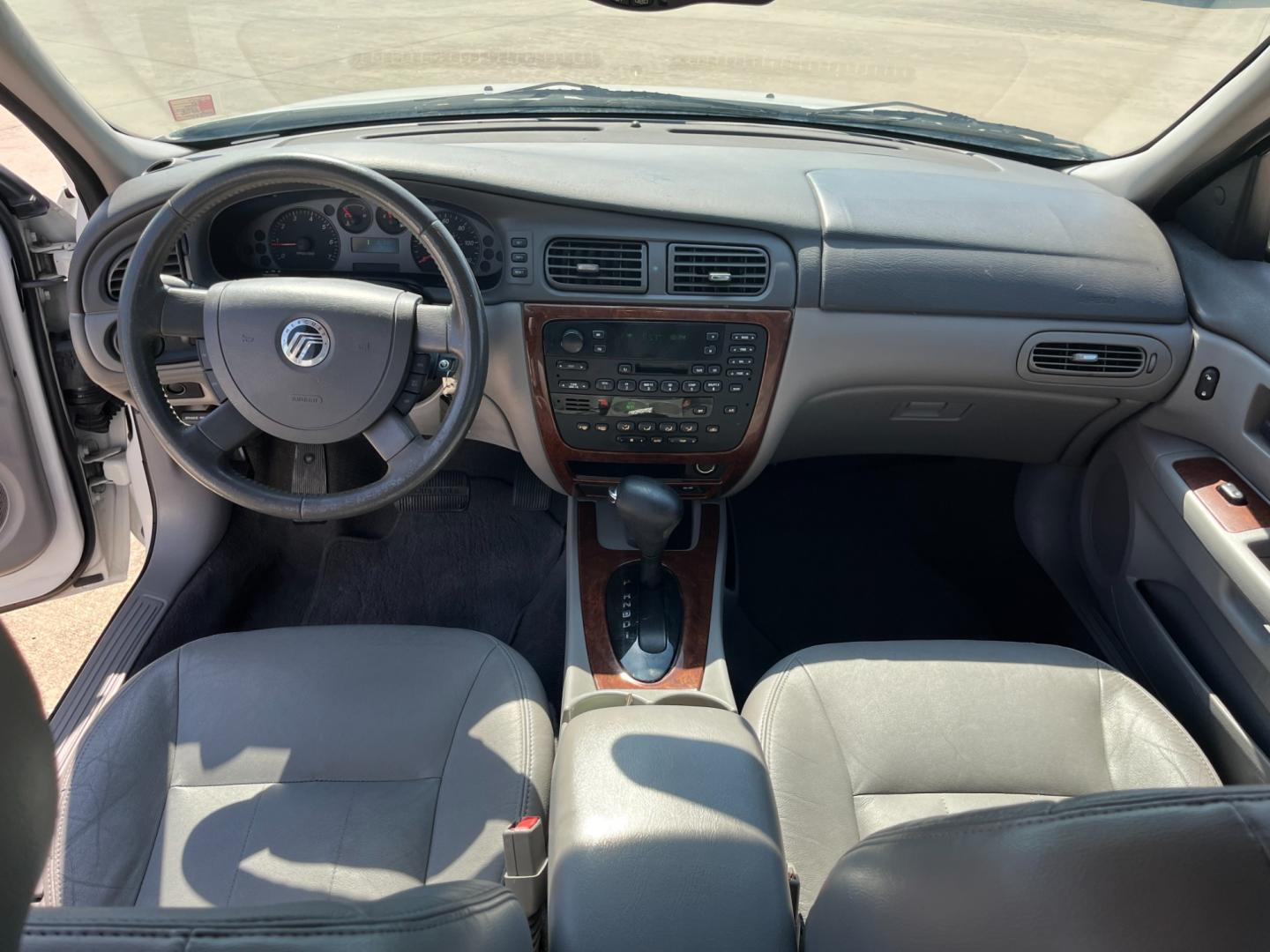 2004 white /TAN Mercury Sable LS Premium (1MEHM55S54A) with an 3.0L V6 SOHC 24V engine, 4-Speed Automatic Overdrive transmission, located at 14700 Tomball Parkway 249, Houston, TX, 77086, (281) 444-2200, 29.928619, -95.504074 - Photo#10